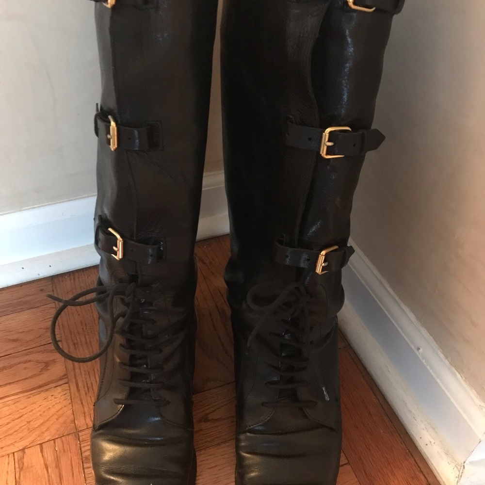 Burberry knee- height boots.